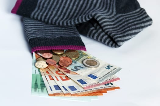 Hiding money in socks is an unsafe investment. Money hiding place in socks