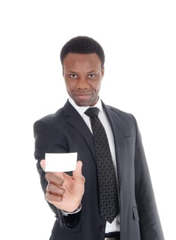 A handsome young African American businessman holding an empty.businesscard, in suit and tie, isolated for white background.