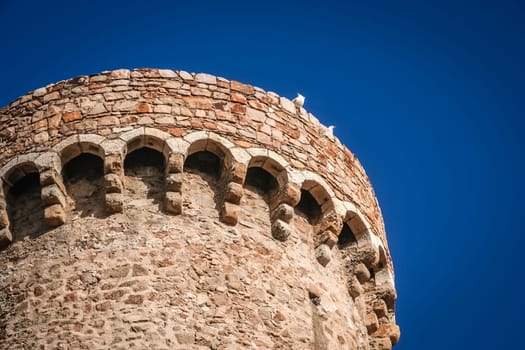 Tower and walls of the Tossa de Mar castle in Costa Brava, Catalunya, Spain