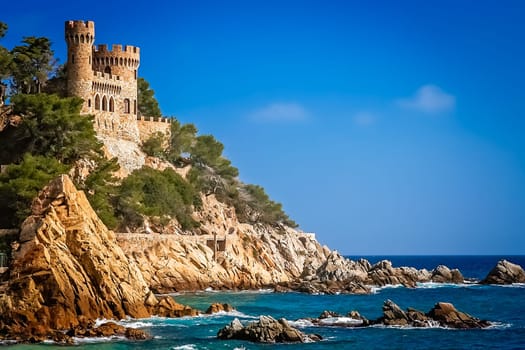 Beautiful Sant Joan Castle on the rocky coast of Costa Brava in Spain
