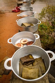Pots with simple african meals on sale