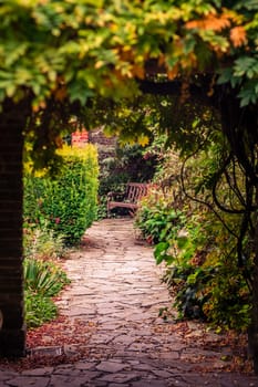 Stony pathway in a Rookery public park in Streatham Common in London in summer