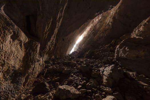 Ponicova cave entrance in the left bank of the Danube in Ciucaru Mare Mountains, Romania