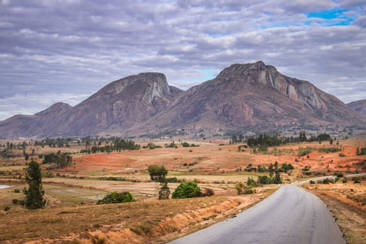 Road going through the stunning landscape of Madagascar highlands, central Madagscar