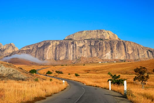 Road going through the stunning landscape of Madagascar highlands, central Madagscar