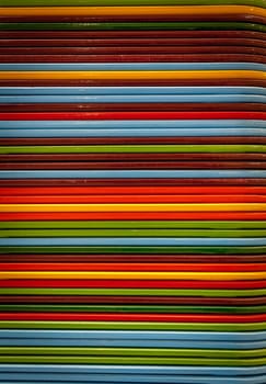Pile of colorful food trays in the restaurant
