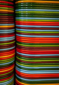 Pile of colorful food trays in the restaurant