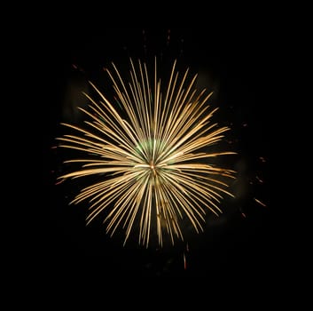 Yellow fireworks on night sky background