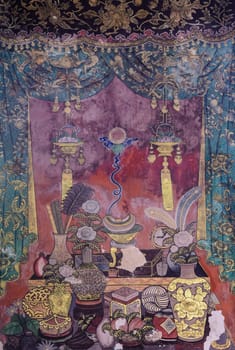 Ancient Thai mural art in Chinese style on temple wall in Bangkok, Thailand