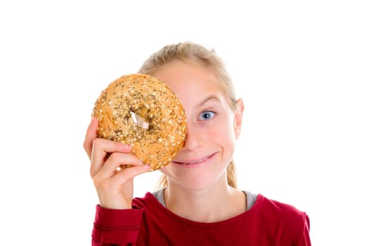 nice blond girl in front of white background looking through a big bagel