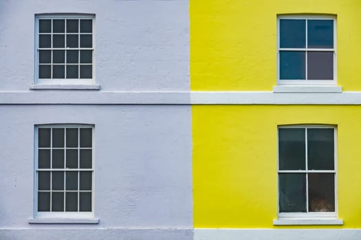 Colorful yellow and blue home facade in Hastings, England, UK
