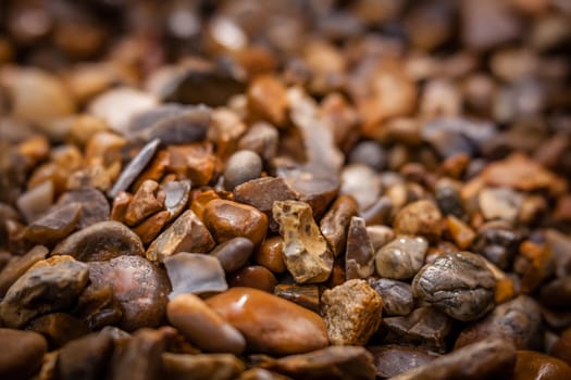 Soft focused blurred picture of a peebles on the ground in the garden