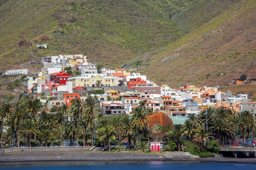 Colourful homes on a hill in San Sebastian town in La Gomera, Canary Islands, Spain