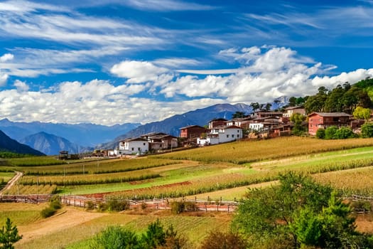 Small village among beautiful mountain landscape in Yunnan province in China