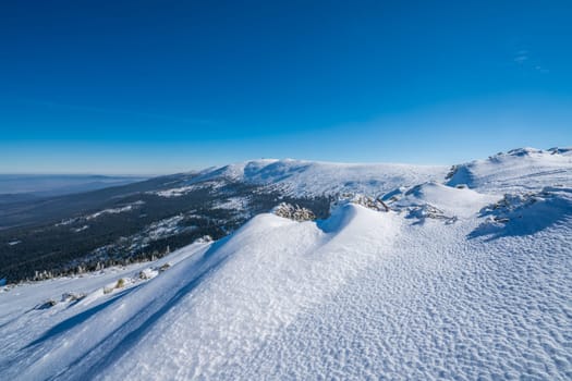 Winter landscape of a Karkonosze mountains as seen from the Szrenica mountain, Poland