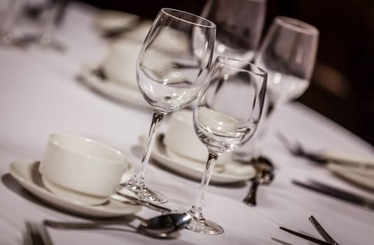 Wine glasses on the table before wedding dinner