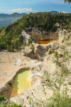 Crater lakes of stunning Wawo muda volcano in Flores in Indonesia