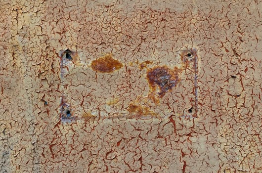 Detail of the torn off nameplate from old metal door
