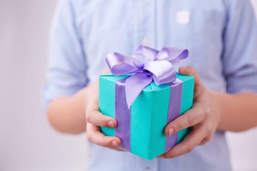 Close-up of gift box in hands