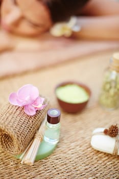 Cosmetic objects with relaxed female on background