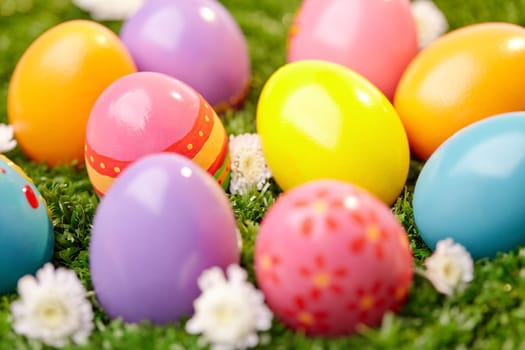 Colorful Easter eggs on grass