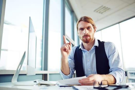 Portrait of a serious man at his workplace