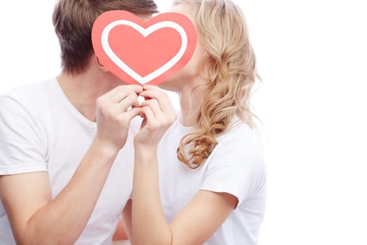 Kissing couple with a heart