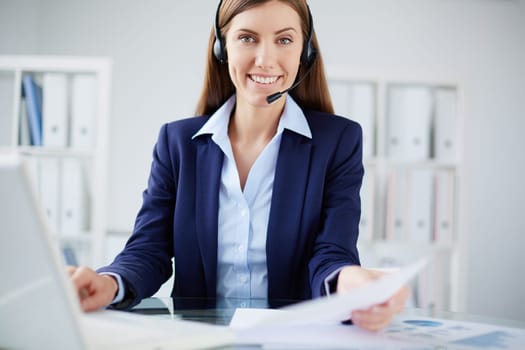 Portrait of a smiling secretary looking at camera