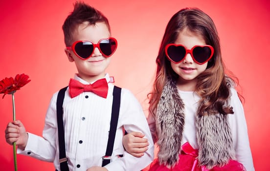 Portrait of a stylish couple of children