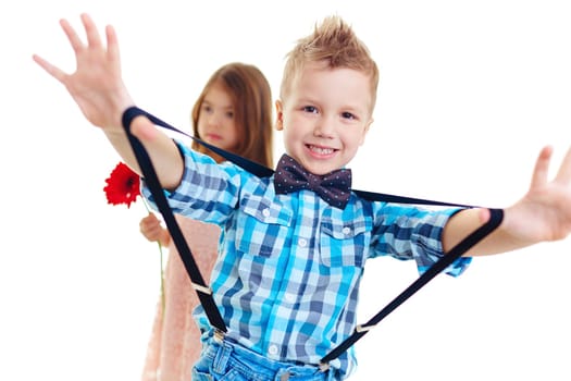 Fashionable little lad posing at camera