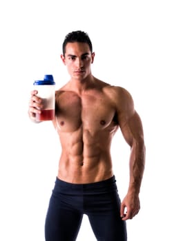 Muscular shirtless male bodybuilder holding protein shake bottle. Isolated on white, looking at camera