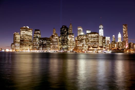 Twilight as the sun sets over Lower Manhattan. Famous New York landmarks.