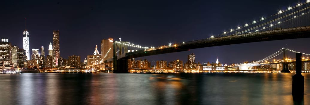 Twilight as the sun sets over Lower Manhattan. Famous New York landmarks.