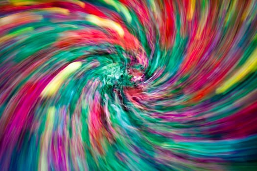 Abstract photo of multicoloured flowers on the ground in the park in spring