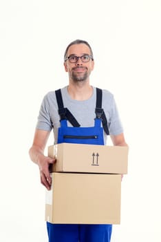 friendly postman with parcels in front of white background