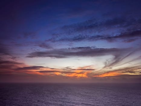 Sunset over the ocean on the coast of Sao Miguel Island in the Azores, Portugal