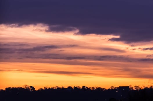 Colorful dramatic cloudy sky at dusk overlay