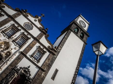 Clock tower of Church of San Sebastian at Ponta Delgada in Ponta Delgada, Sao Miguel Island, Azores, Portugal