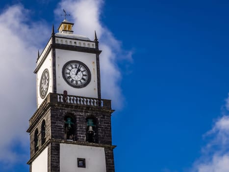 Clock tower of Church of San Sebastian at Ponta Delgada in Ponta Delgada, Sao Miguel Island, Azores, Portugal