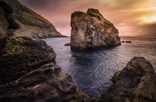 Large rock on the coastline of Sao Miguel Island in the Azores.