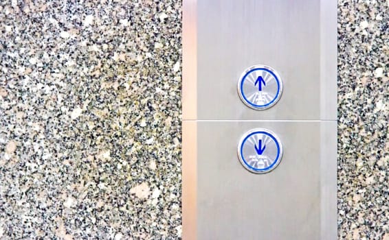 Press the elevator up and keypad elevator