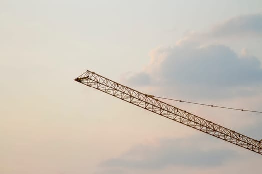 Cranes in everning and sun sky
