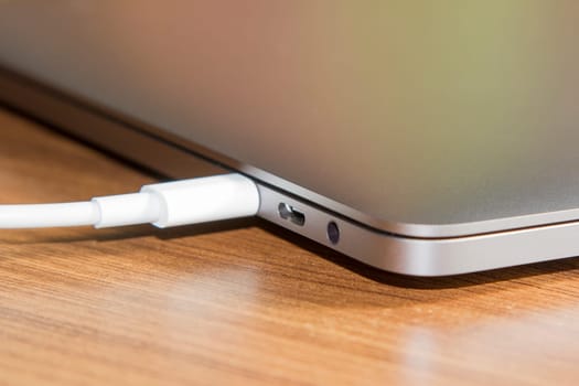USB type-C port and Cable's White of laptop