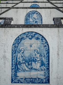 One of many mosaics on the stairs leading to the entrance of the Our Lady of Peace ( Nossa Senhora da Paz ) chapel above the city of Vila Franca do Campo in Sao Miguel, Azores, Portugal