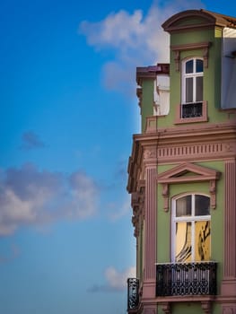 View of the front windows of a restored old home in Ponta Delgada, Azores, Portugal