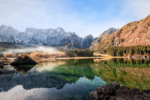 Mountains panorama.  Alpine landscape with lake. Lake of Fusine,Tarvisio,Italy.