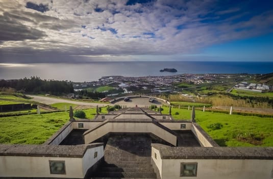 View of the small Ilheu island as seen from the courtyard of the Our Lady of Peace chapel in Franca do Campo in Sao Miguel Island in the Azores.