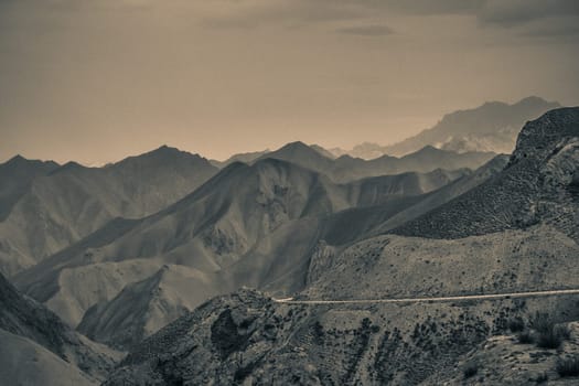 Twisting mountain road in Xinjang province in China leading to Western Tibet