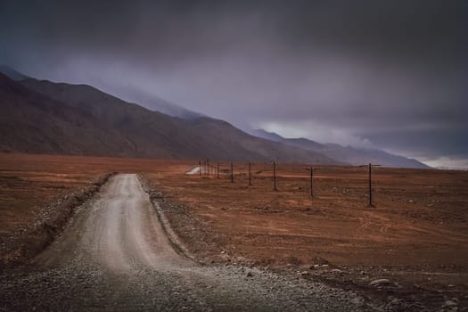 Mountain road through the high central Tibetan plateau, Tibet, China