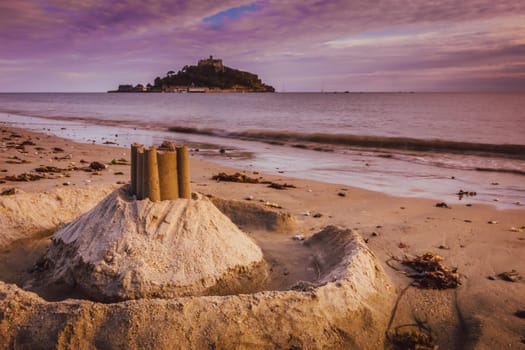Sandy sculpture of an abbey on top of the hill of St Michaels Mount, Marazion, Cornwall, England